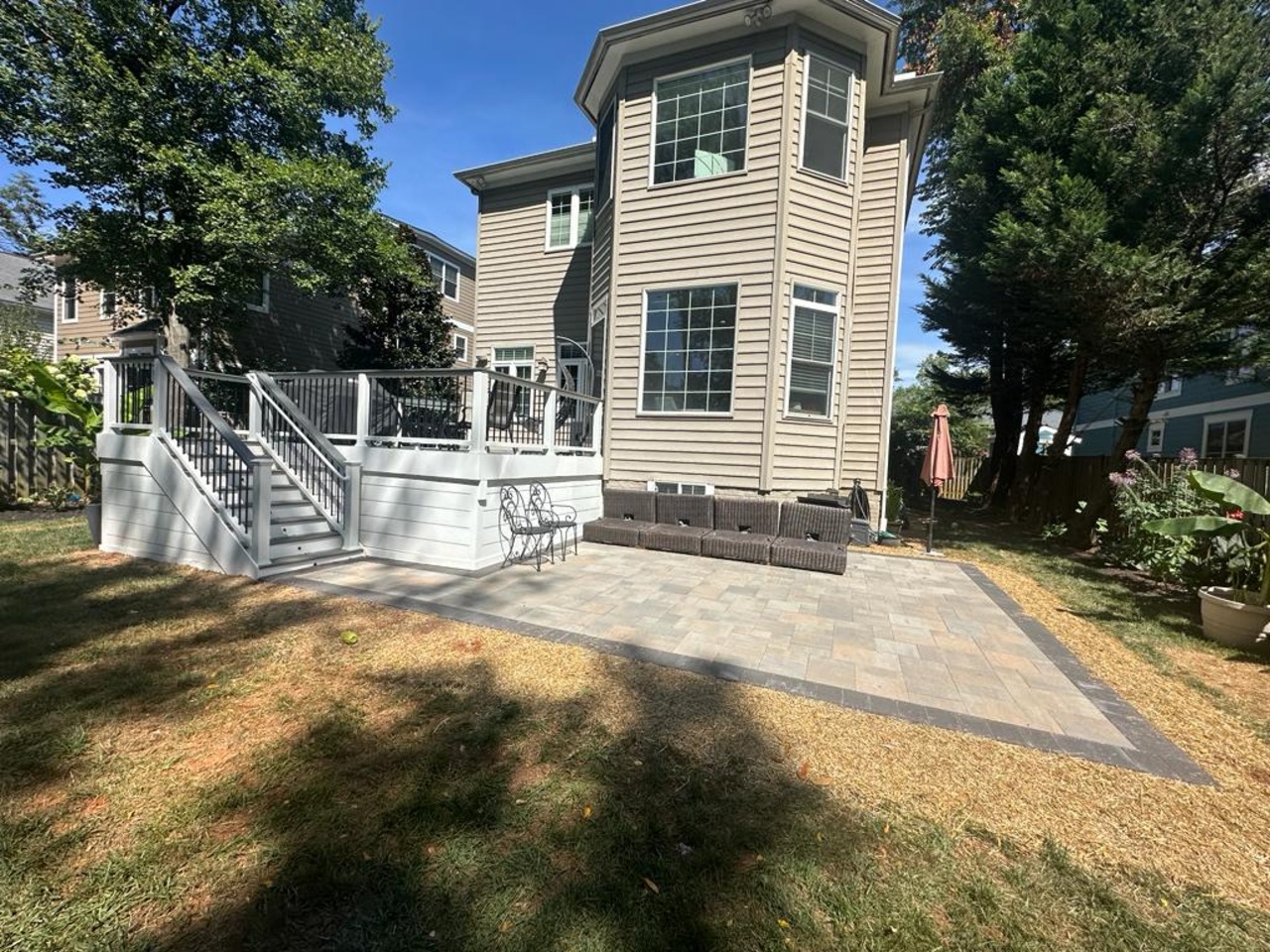 Composite Deck with Modern Skirting and Belgard Paver Patio